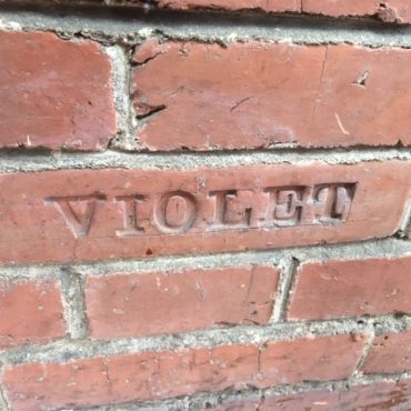 Rowntree children's names all inscribed into the Low Hall outer wall