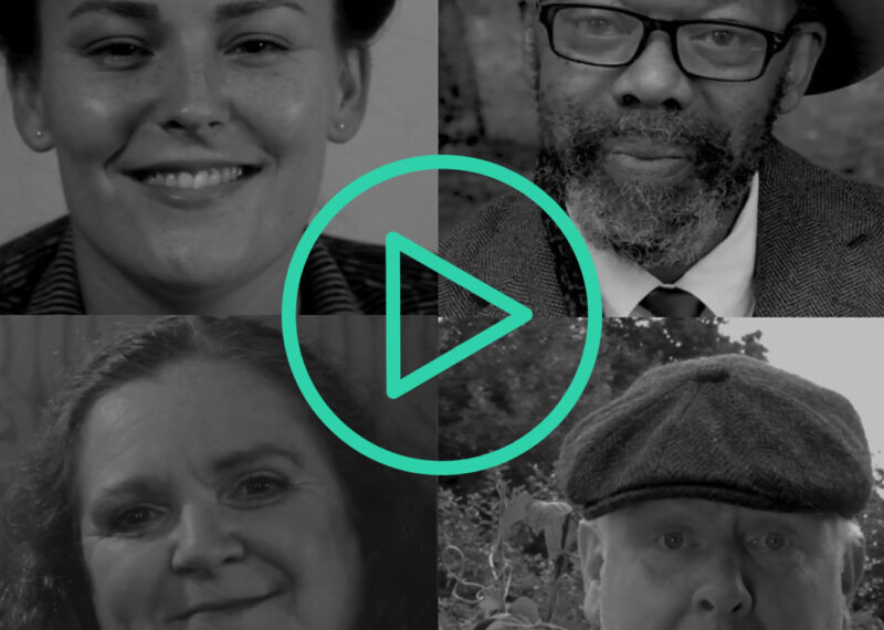 Black and white collage of four close-ups. A young woman with dark hair in a 1940s style, smiling; an older man with a beard and wide-brimmed hat, an older woman with long hair, a man with white hair wearing a flat cap. A bright green "play" video icon is superimposed on top of the images.
