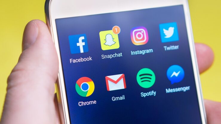Phone screen with social media icons